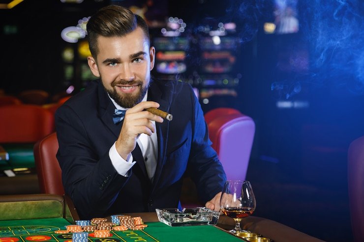 Interface permainan Andar Bahar PMGC dengan area taruhan, streaming dealer, dan chat pemain